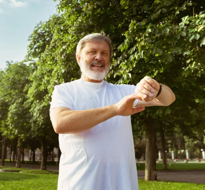 Man stretching in a park
